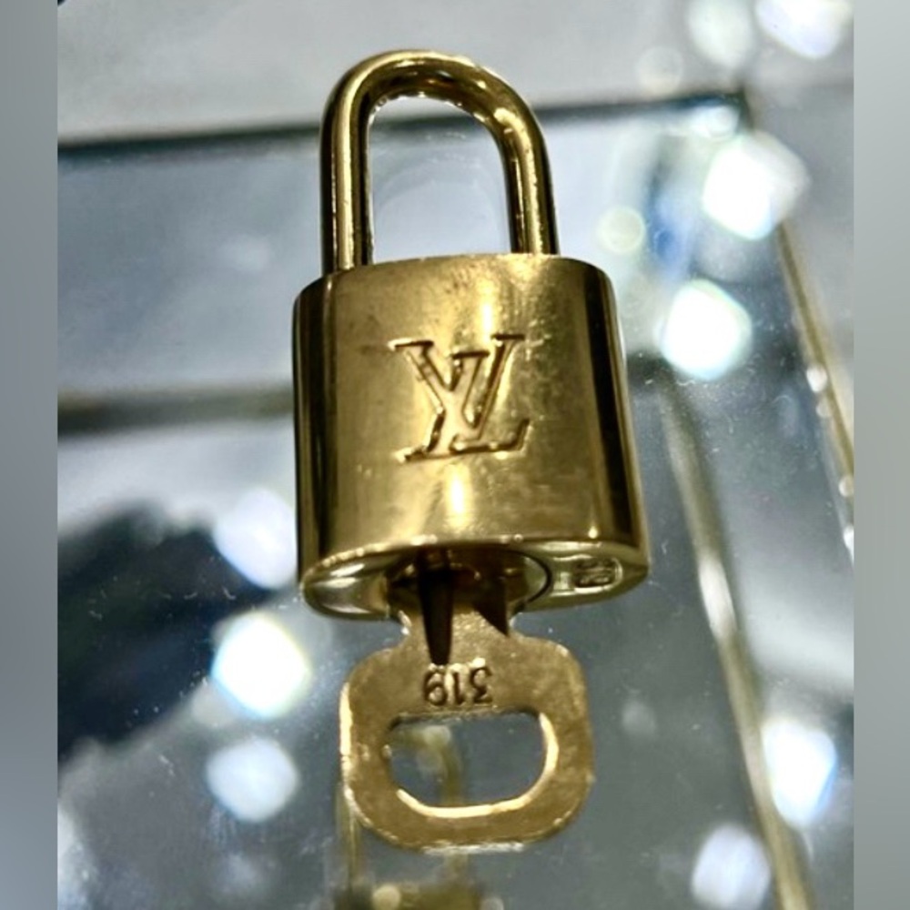 Louis Vuitton #319 Lock and Key - Authentic
